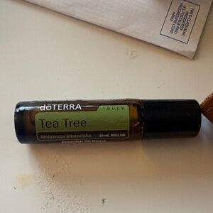 Doterra Tea Tree Touch Roll-On with Green Label and Black Cap
